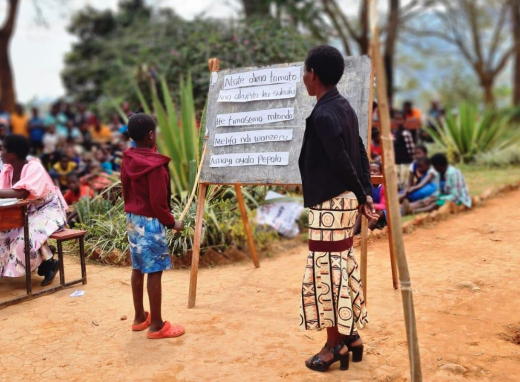 A child takes part in a spelling bee in Malawi as part of literacy project by Temwa